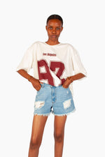 LIGHT BLUE RIPPED DENIM SHORT