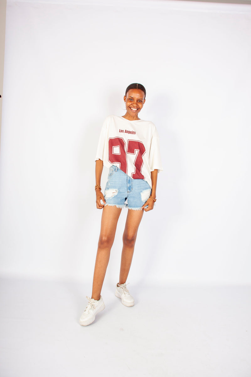 LIGHT BLUE RIPPED DENIM SHORT