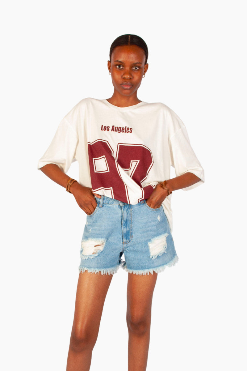 LIGHT BLUE RIPPED DENIM SHORT